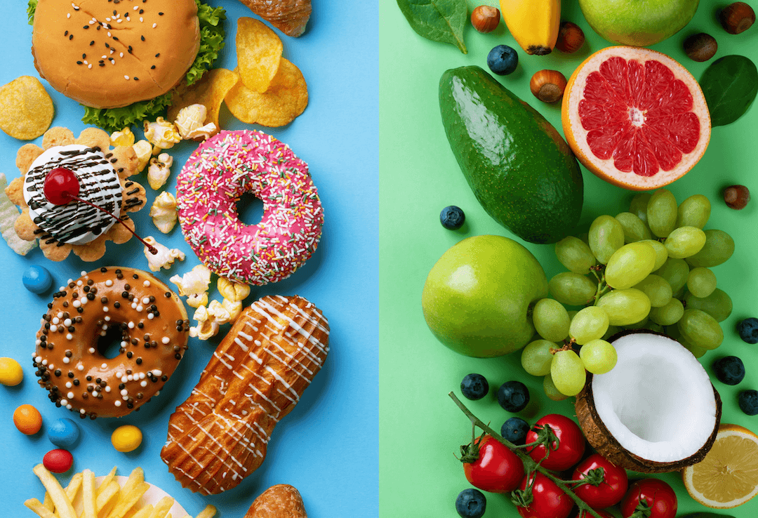 A split image with one side depicting junk food such as donuts and chips on a blue background and the other side showing healthy options such as grapes and grapefruit on a green background. 